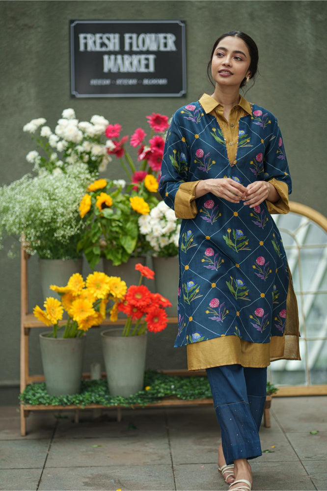 
                  
                    DAHLIA 2 LAYER KURTA blue geo mustard
                  
                