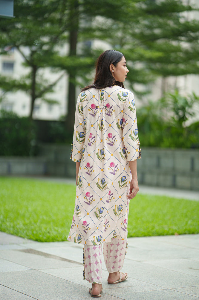 
                  
                    IRIS KURTA & PANT cream jaal
                  
                