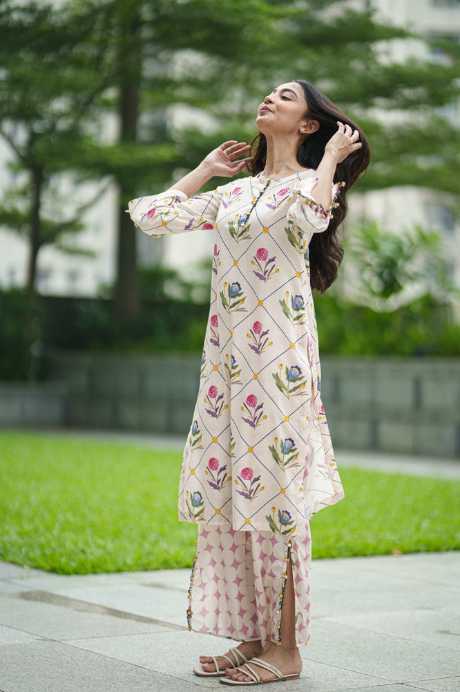 
                  
                    IRIS KURTA & PANT cream jaal
                  
                