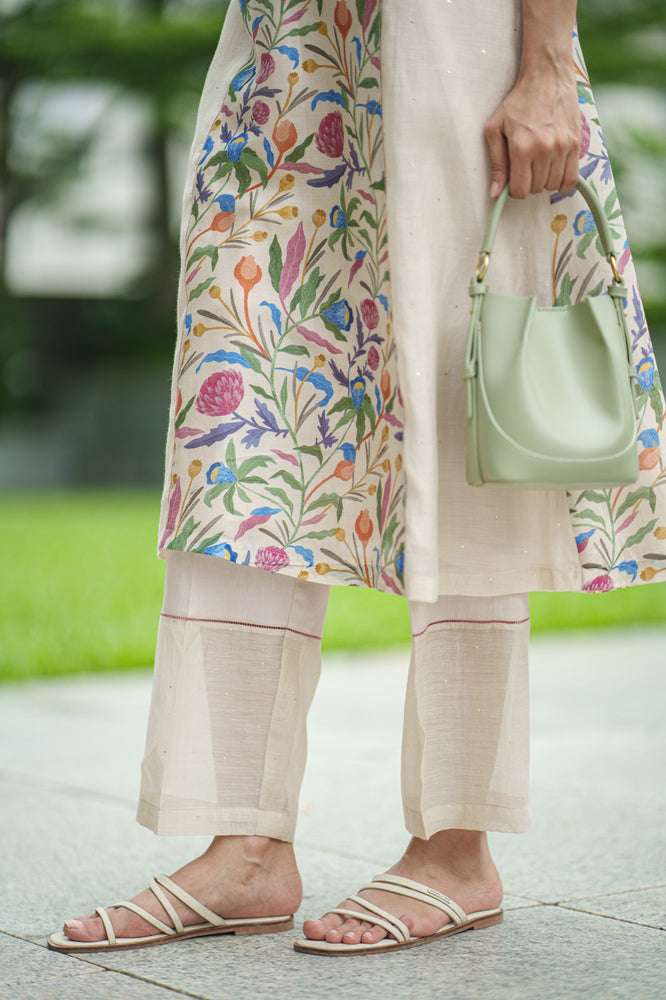 
                  
                    TULIP KURTA & SLIP cream jaal
                  
                