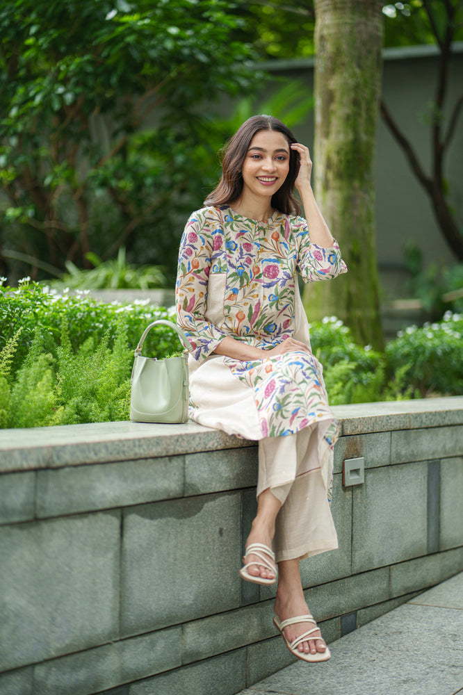 
                  
                    TULIP KURTA & SLIP cream jaal
                  
                